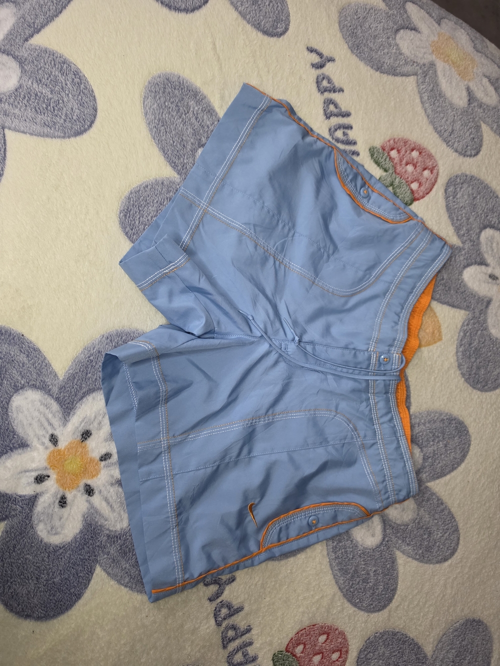 Nike Light Blue Women's Athletic Shorts with Orange Trim